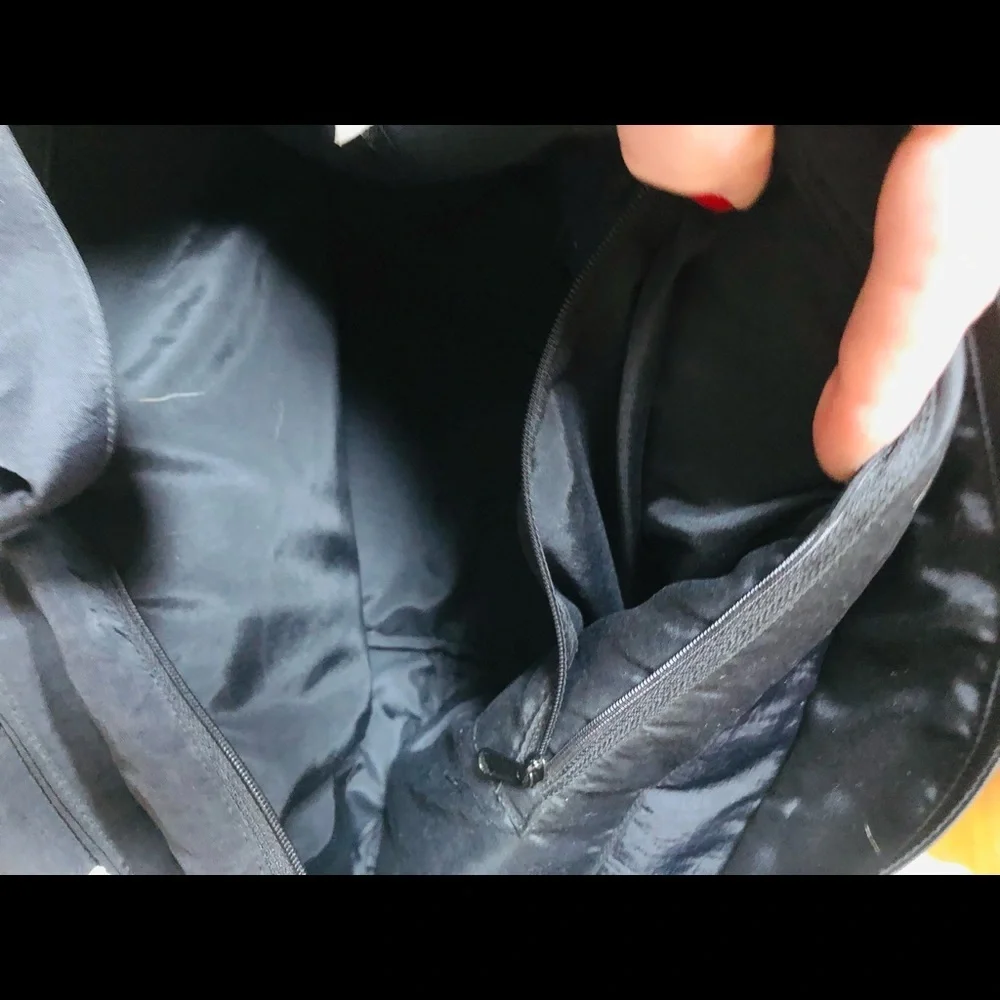 Arisha black super cute microfiber like fabric bag w/ attached flower detail